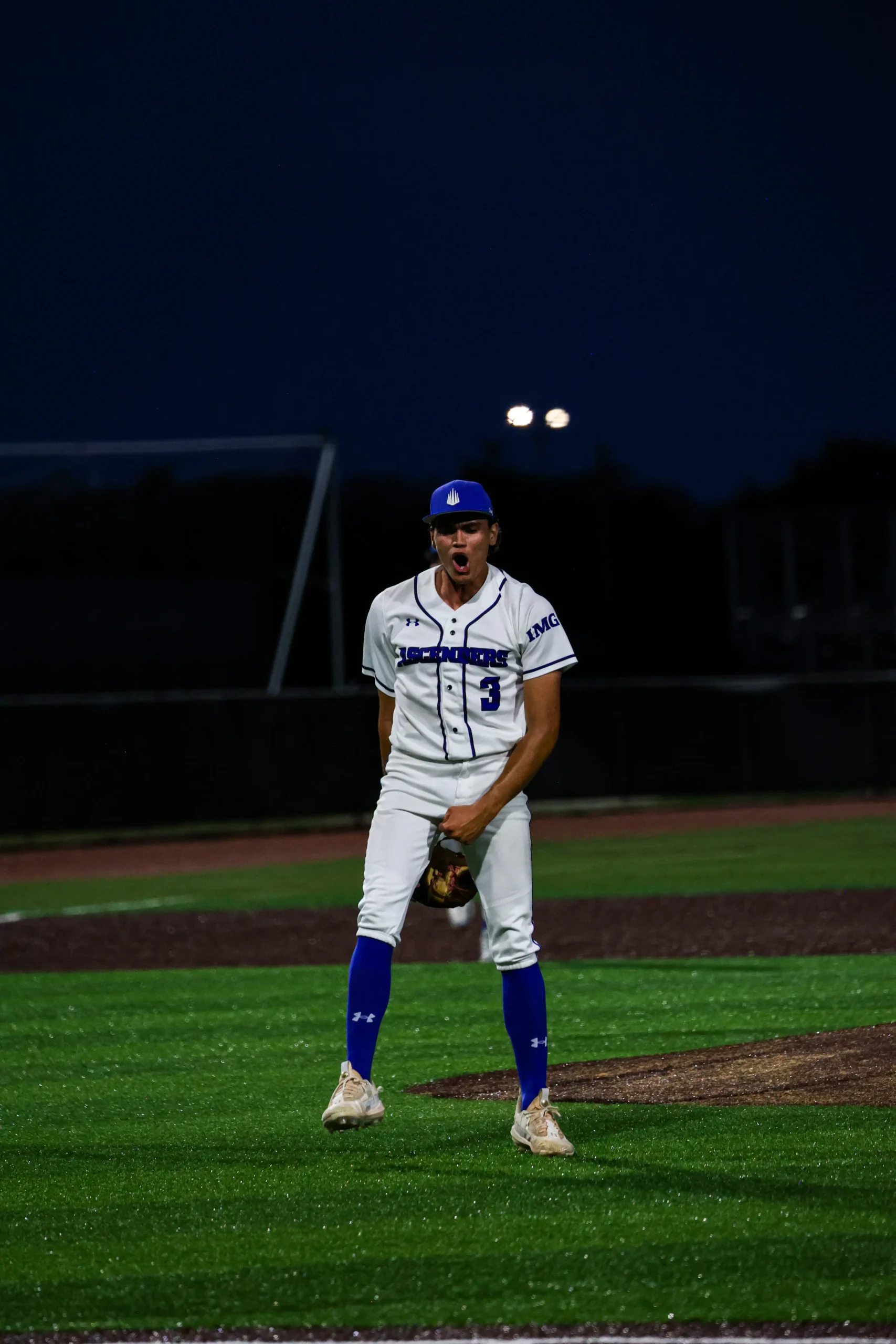 Baseball player Noah Franco, IMG Academy National, TCU celebrating in the photo from ShotByRAC sports photography