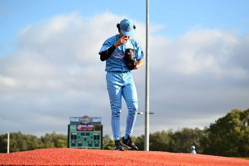 Dru Harper preparing for a pitch in photo from ShotByRAC sports photography